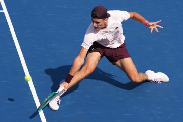 Menšíkovi pomohla při postupu do 3. kola US Open i chladící vesta